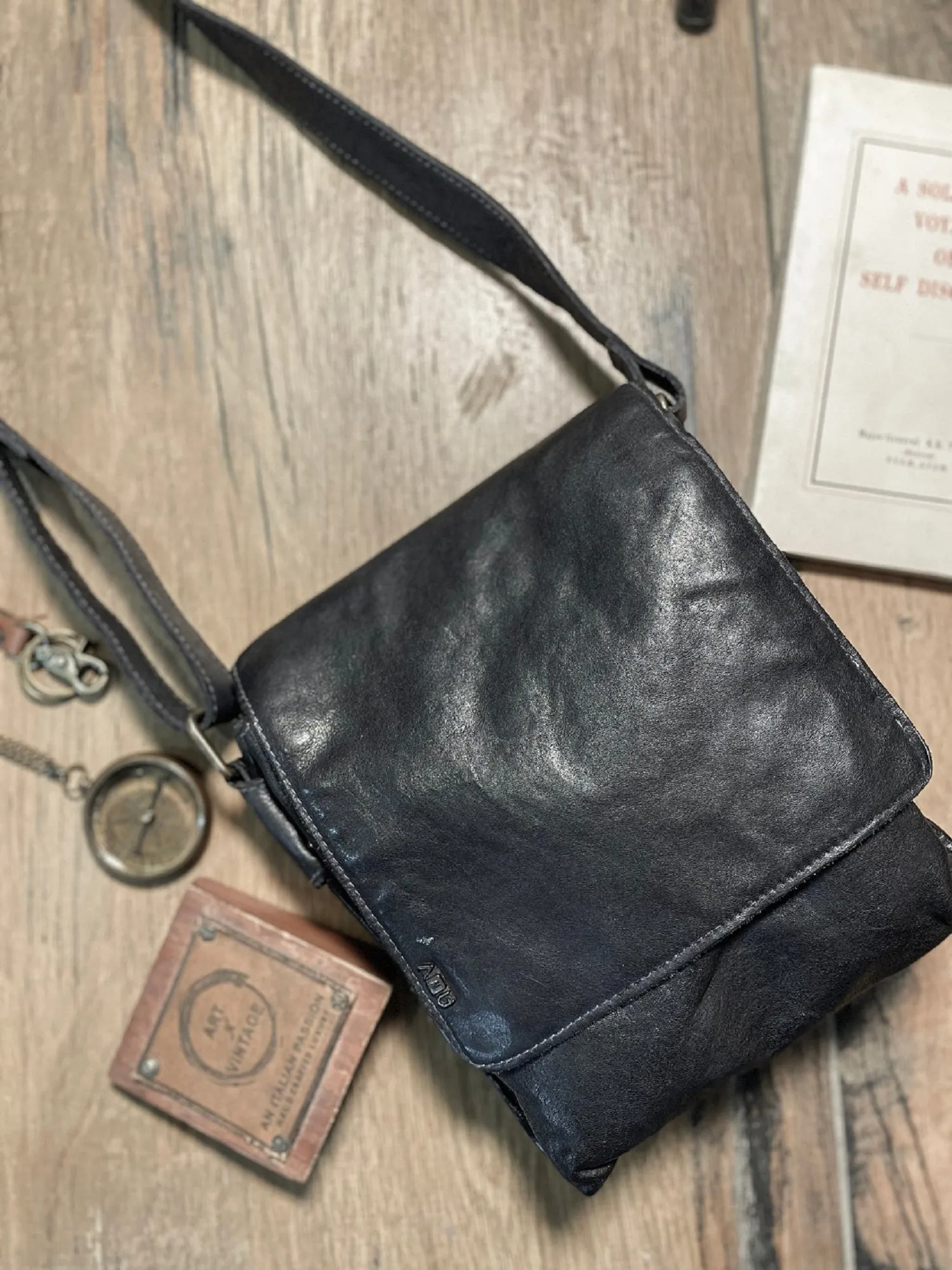 Henry: Black Flap Bag Cross Body In Veg Tan Leather