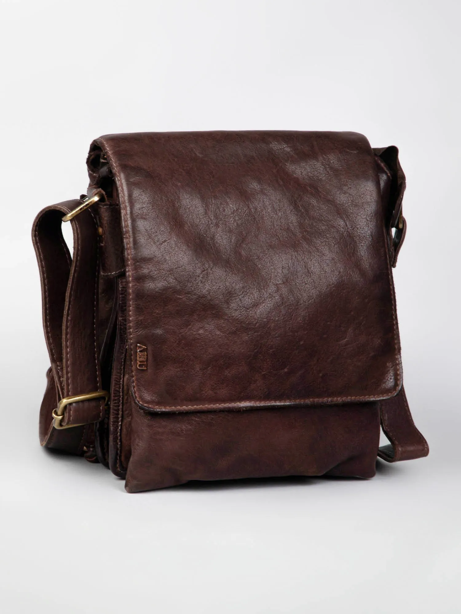 Henry: Black Flap Bag Cross Body In Veg Tan Leather